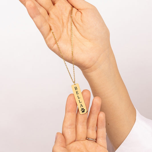 Ketting pootafdruk hond met naam hond gegraveerd op hanger (bar)