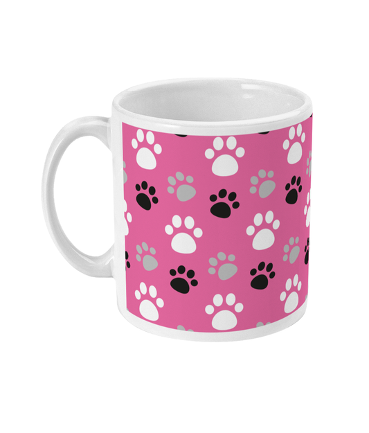 Honden mok met roze en gekleurde hondenpootjes bedrukt